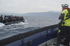 Refugees crossing the Mediterranean sea on a boat heading from Turkish coast to the northeastern Greek island of Lesbos 29 January 2016