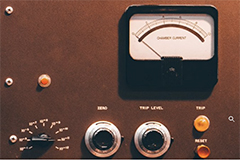 Image of retro panel of nuclear current dials and readers