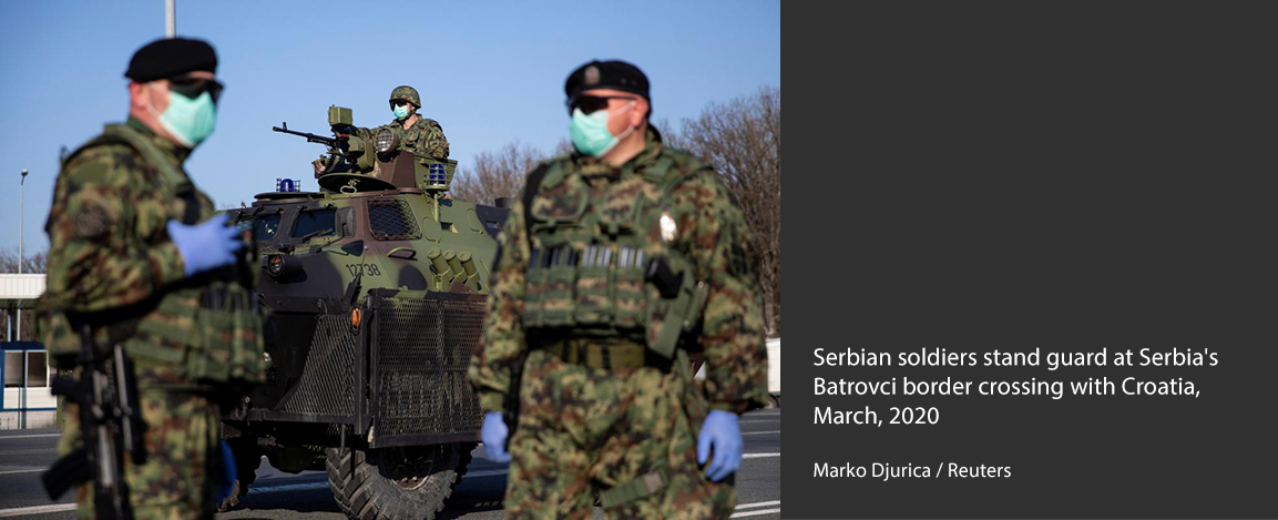 Serbian soldiers stand guard at border crossing with Croatia