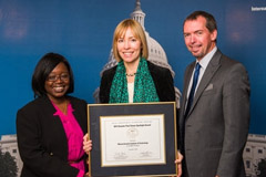 MISTI Associate Director April Julich Perez (center) accepts the award on behalf of MISTI, with NAFSA President Fanta Aw (left) and Martin Simon, son of the late Senator Paul Simon.  Photo: NAFSA: Association of International Educators